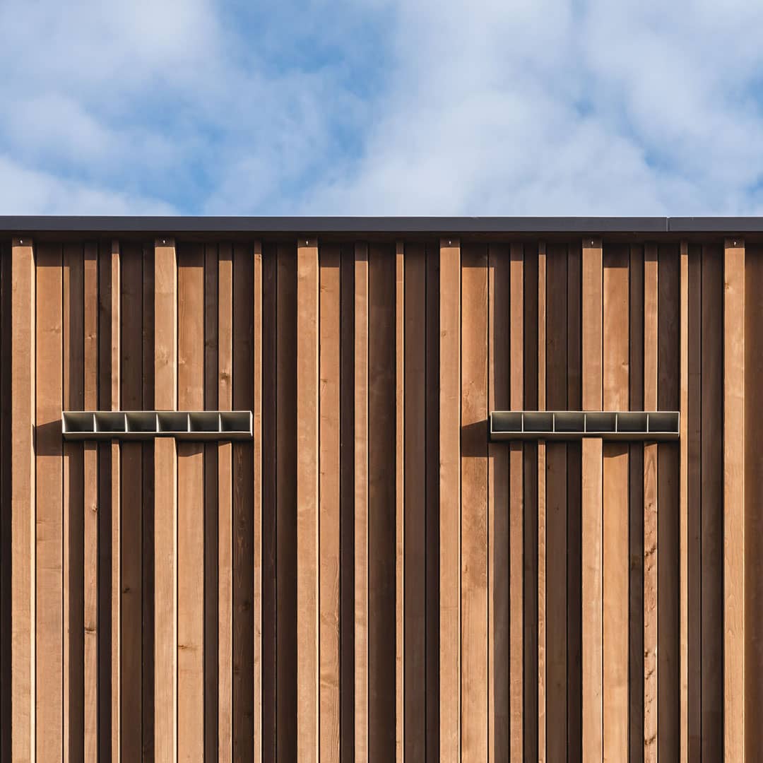 Architektur Fotograf St. Gallen Holzfassade mit Lüftungsgitter